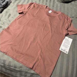 Lululemon athletica relaxed swiftly short sleeve in red clay color size 2